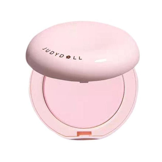 Purple-toned pressed setting powder compact, open lid showing powder pan.