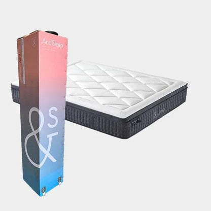 Mattress box and black mattress with white quilted top, upright packaging shown