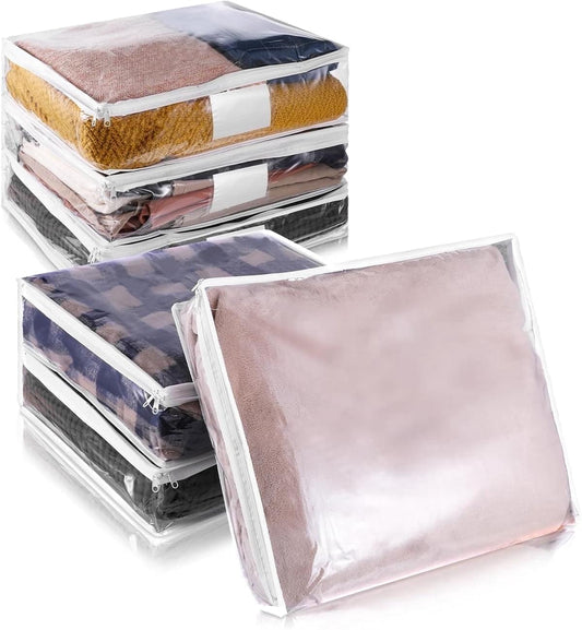Clear zippered storage bags stacked, transparent panels with white zipper trim