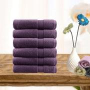 Set of 6 ultra-light cotton face washers in aubergine, folded towels