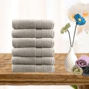 Set of light gray cotton face washers, folded and stacked