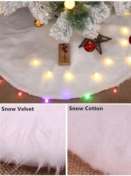 Plush white tree skirt fabric swatch with snowflake-like pile, velvet texture