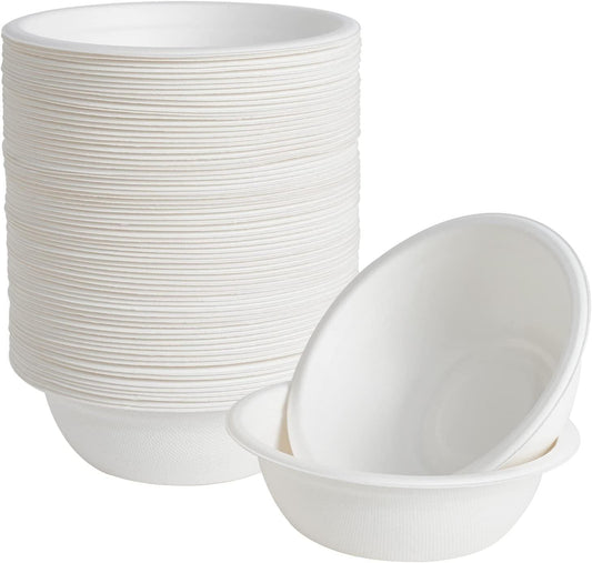 White disposable round bowls, stacked with one bowl in front, sugarcane fiber