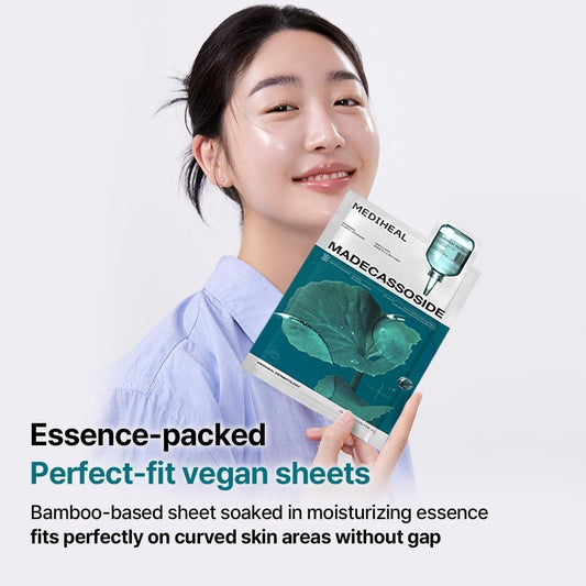 Madecassoside essential mask package held by smiling person with pipette dropper
