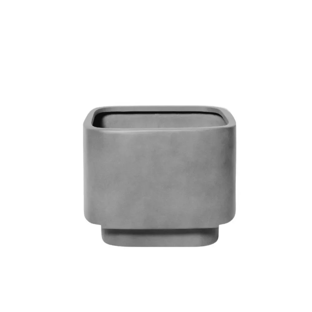 Concrete grey cube planter with wide rim and recessed inner opening