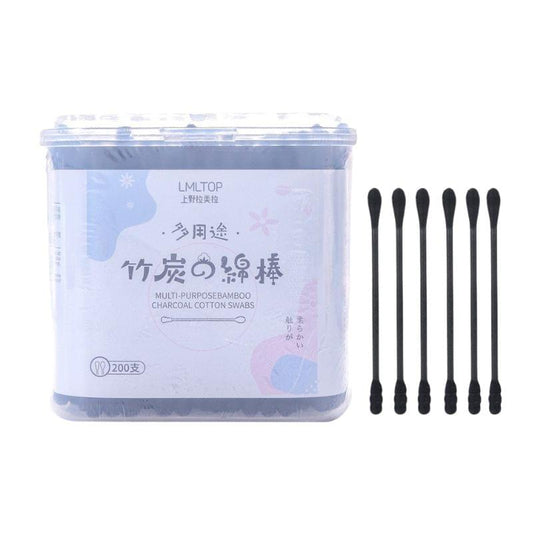 Charcoal black cotton swabs in clear plastic jar, dual-head paper sticks