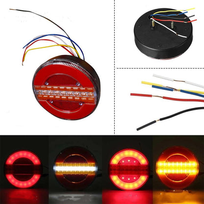 LED tail light with red lens and amber LED strip, with attached wiring and connector