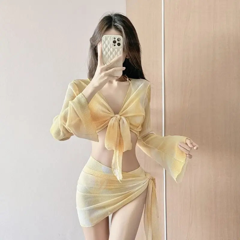 Yellow ribbed two-piece swimsuit with tie-front cover-up top and wrap mini skirt
