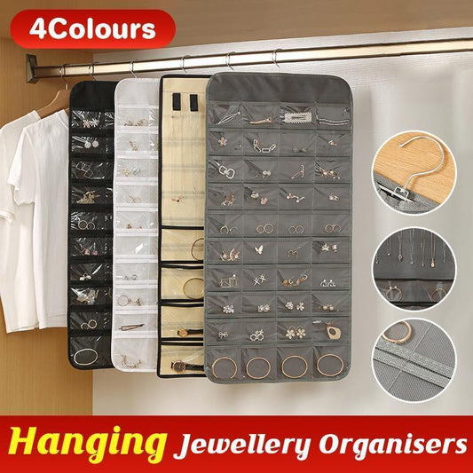 Grey hanging jewelry organizer with clear pockets and earring ring slots