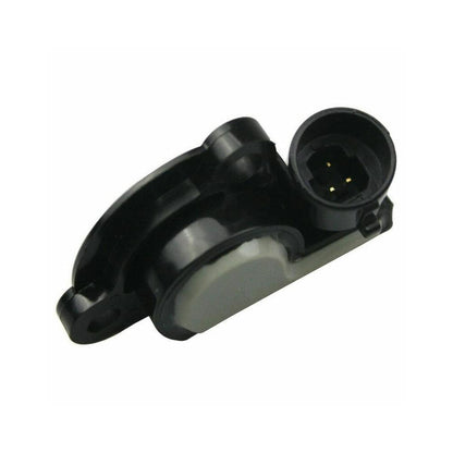 Black throttle position sensor, side view with plug socket