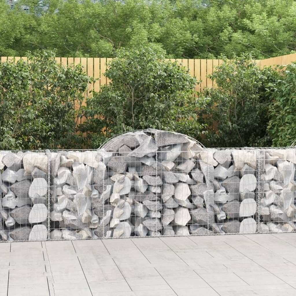 Stone-filled arched gabion basket with galvanized wire mesh, outdoor wall panel
