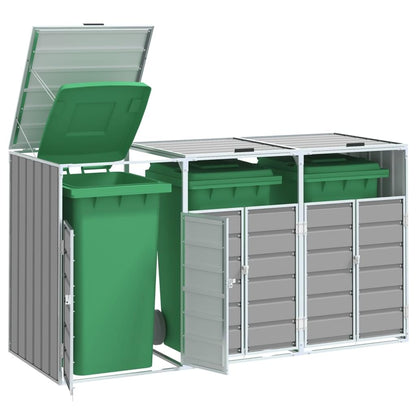 Grey steel triple wheelie bin storage with open lids and three green wheelie bins inside