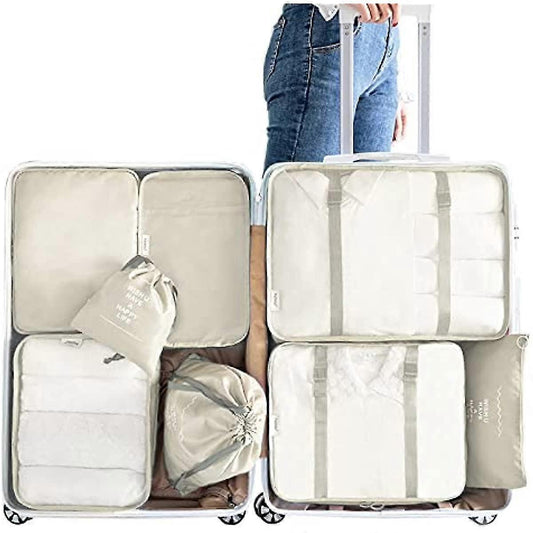 Cream fabric packing cubes set of 8 with zipper, shown open with organizer compartments