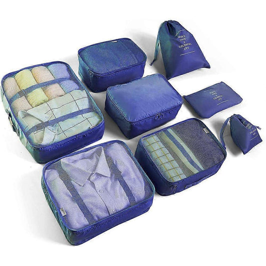 8-piece travel organizer set of blue packing cubes and pouches, mesh panels, zip tops