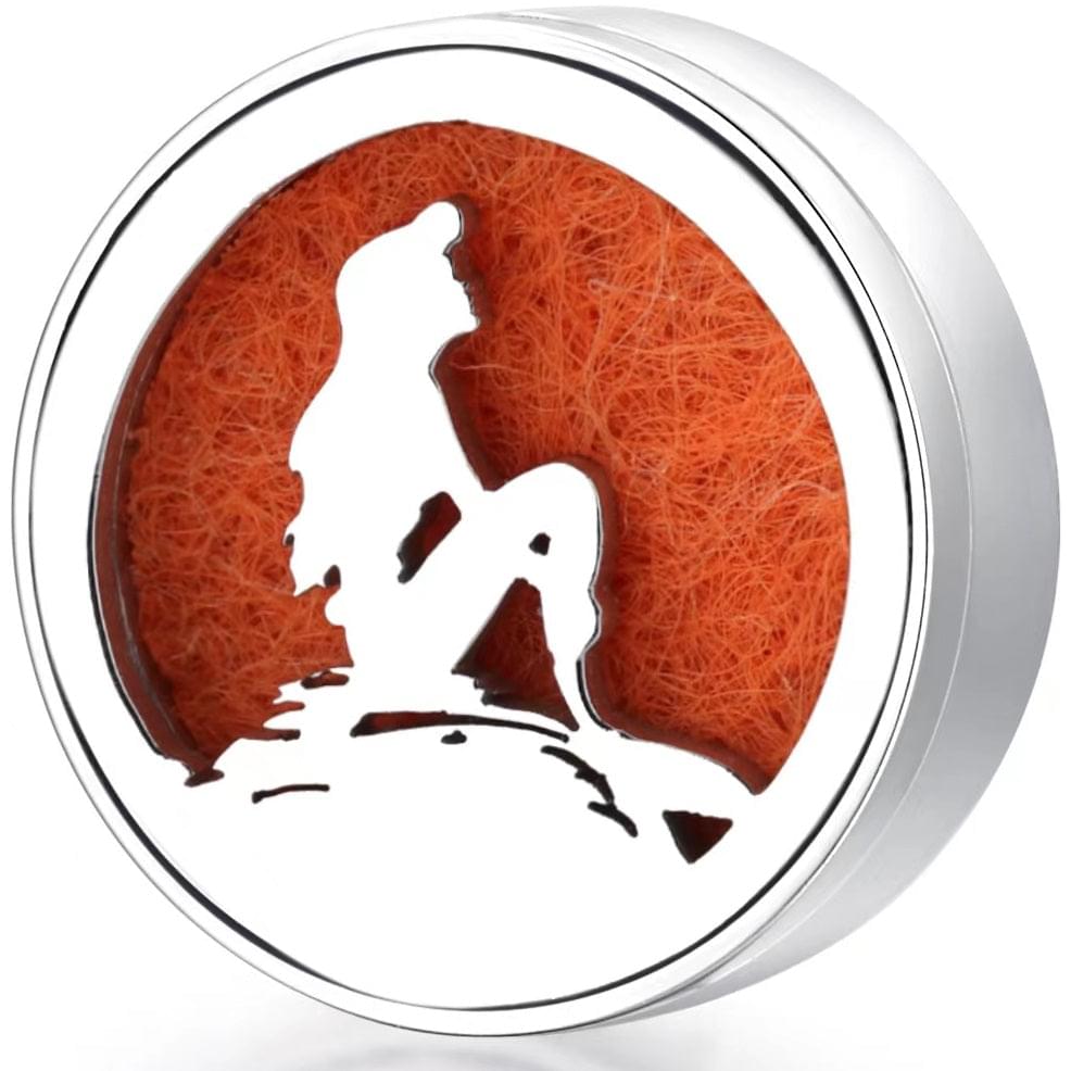 Wearable diffuser locket with orange felt and white deer design, silver ringed casing