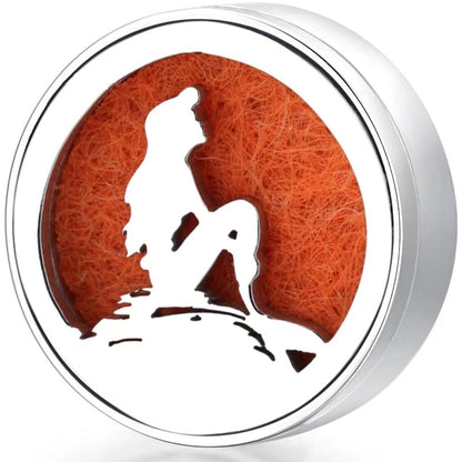 Wearable diffuser locket with orange felt and white deer design, silver ringed casing
