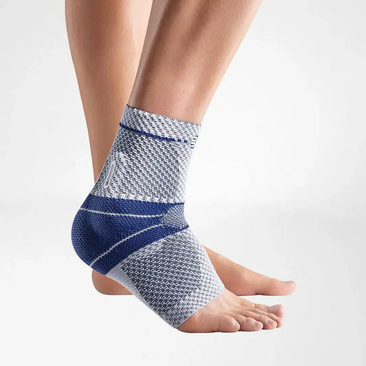 Ankle support sock with blue and gray knit bands, wraparound heel panel
