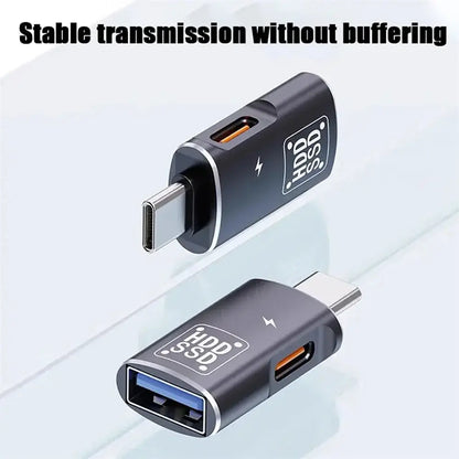 Black USB-C OTG adapter with two orange ports and USB-C plug
