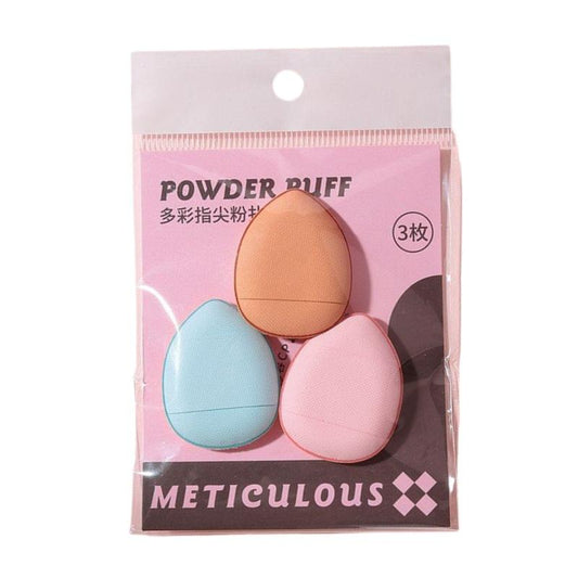 Set of 3 mini finger makeup puffs in tan, pink and blue, in clear pouch