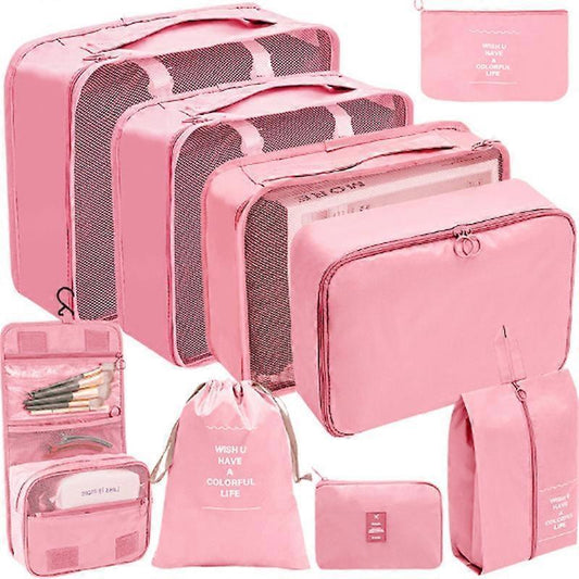 Pink packing cube set with mesh panels, zippered compartments, and hanging pouches