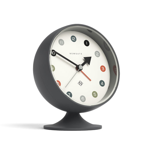 Grey spheric alarm clock with black pedestal stand and red seconds hand