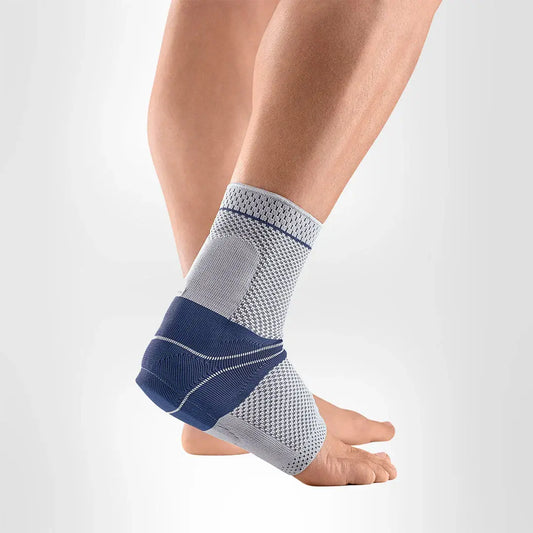AchilloTrain ankle support sock, gray with blue stabilizing wrap on foot