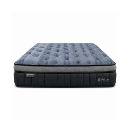 Blue quilted mattress with dark side panels and & Prime branding on base