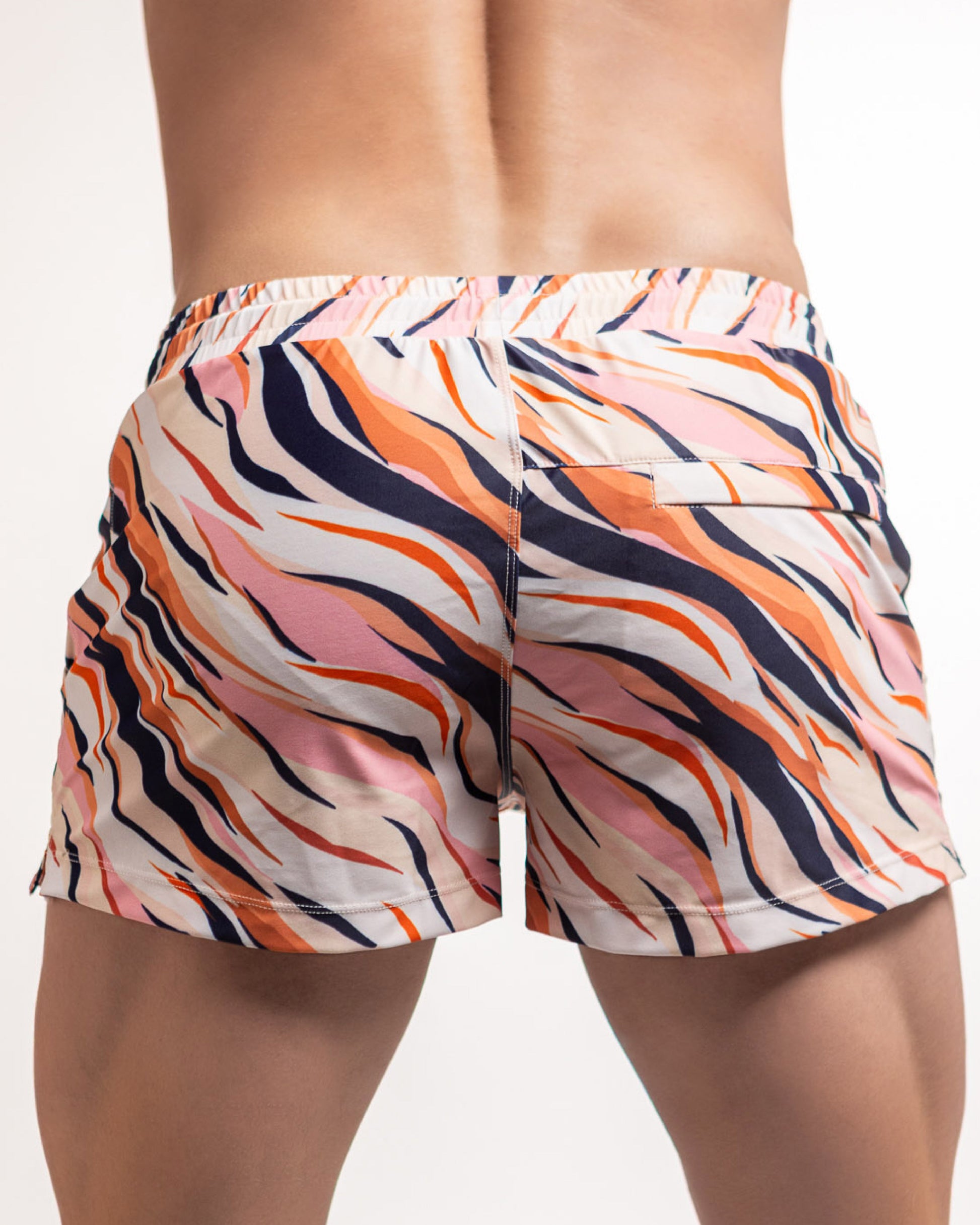 Tiger-print swim shorts with elastic waistband and center back seam