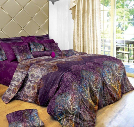 Purple and teal duvet quilt cover set with paisley pattern and matching pillowcases on bed