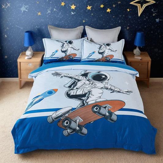 Kids quilt cover set with astronaut graphic on white and blue bedding