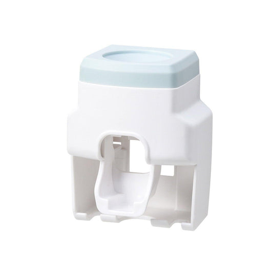 Toothpaste squeezer dispenser unit with toothbrush holder, white with light blue top