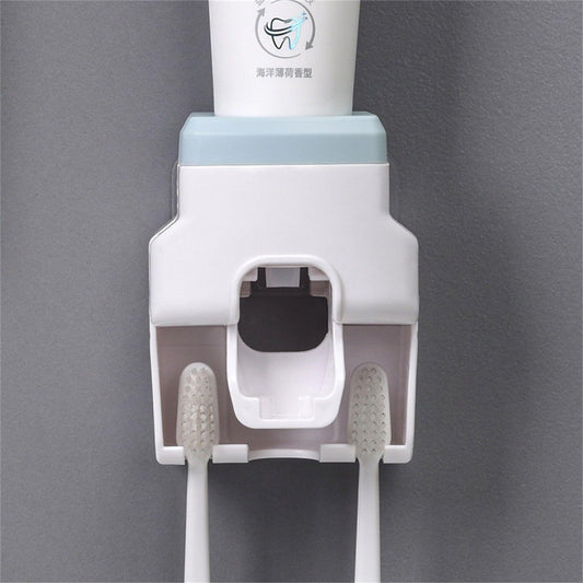 Wall-mounted toothpaste squeezer dispenser with toothbrush holder, white and light blue