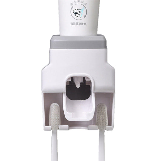 Wall-mounted automatic toothpaste dispenser with toothbrush holder, white and grey