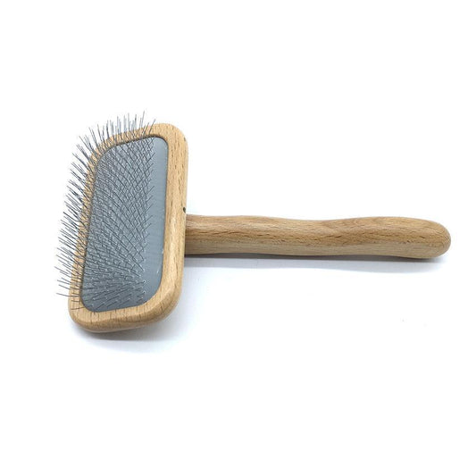 Pet slicker brush featuring a wooden handle and gray pin brush head