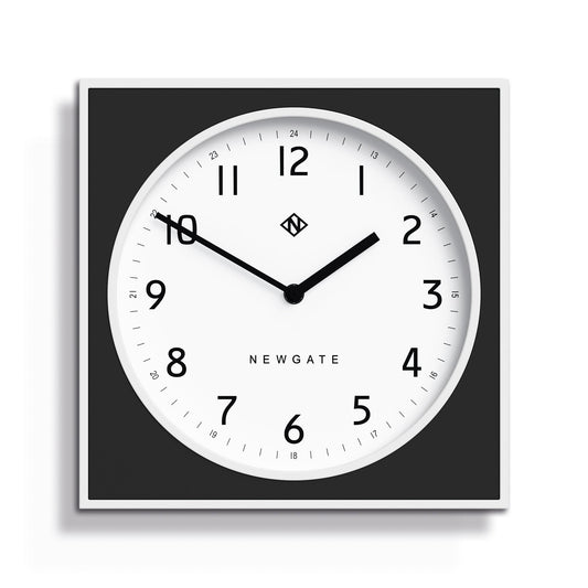 Black square wall clock with white face and burger & chips style hands