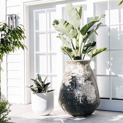 Speckled ceramic vase with flared rim and narrow neck, gray and white finish