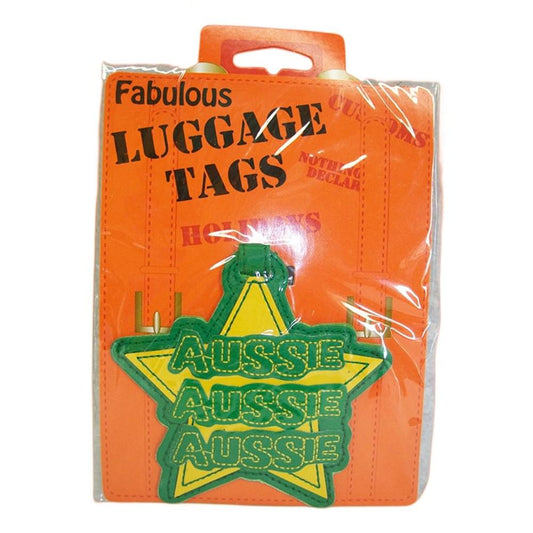 Orange luggage tag with green star-shaped badge and bold “AUSSIE” text patch