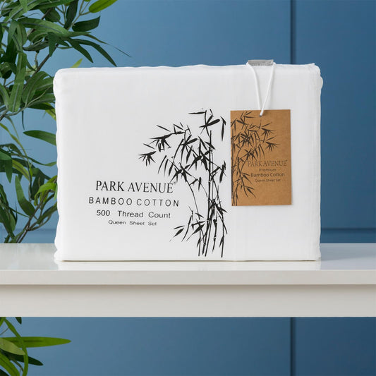 White bamboo cotton sheet set, folded with product tag on top