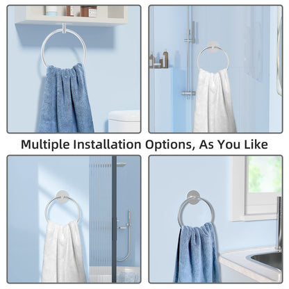 Silver bathroom towel ring holding a blue hand towel on a round wall bracket