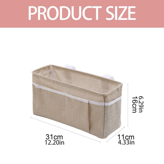 Beige bedside storage bag with white trim, rectangular shape