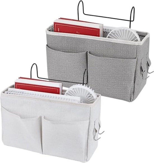 Gray hanging bedside organizer with two front divider pockets and top handles