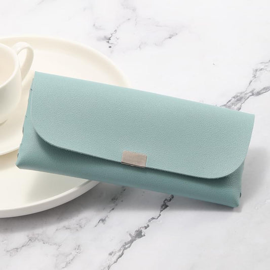 Sleek blue PU eyeglass pouch with fold-over flap and small metal snap tab