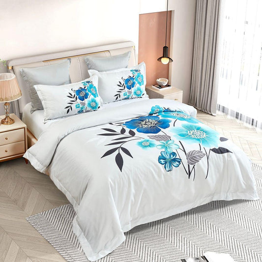 White quilt cover set with large blue flower design and matching pillowcases in bed set