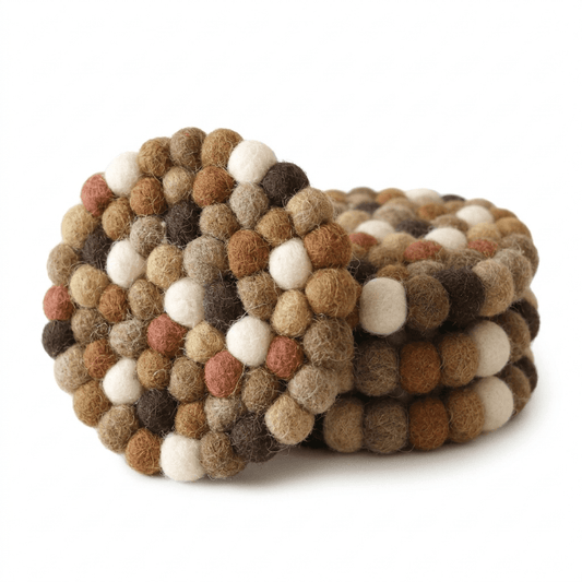 Round wool felt coaster with raised pom-pom clusters, earth-tone mix