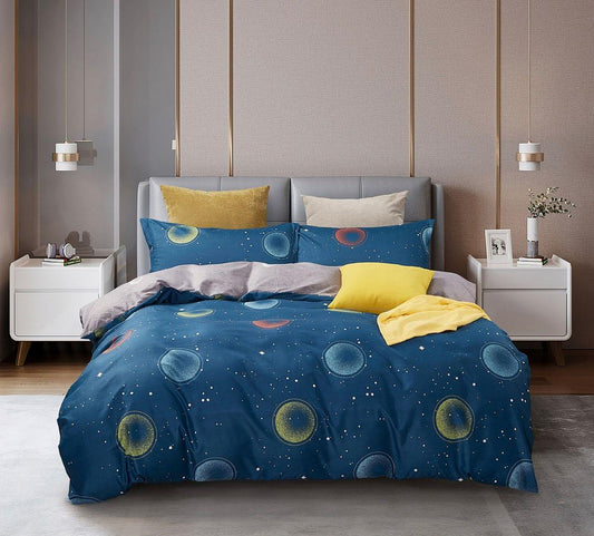 Blue duvet cover with colorful bubble and planet print, yellow and gray accent pillows
