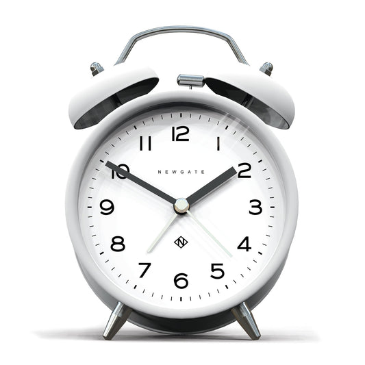 White twin-bell alarm clock with matte pebble finish, black hands, and hour markers