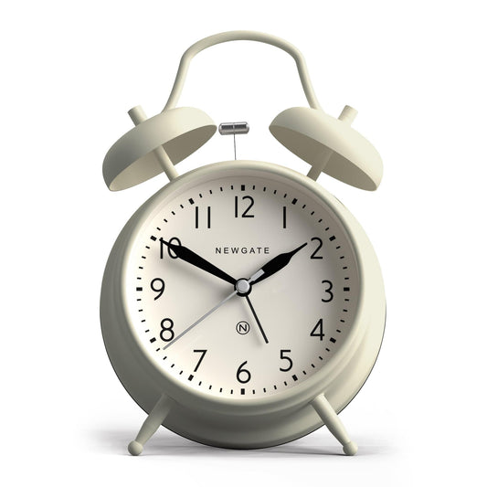 Cream alarm clock with twin bells and round face with black hour markers