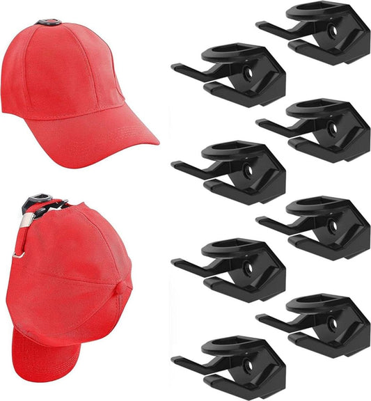 Cap hook set holding a red baseball cap with black wall clips