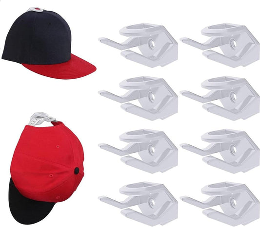 Cap rack set of white wall hooks with a black-and-red cap and a red cap