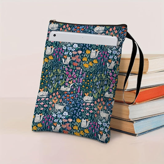 Zippered book sleeve with dark floral and cat print, black zipper and carry strap